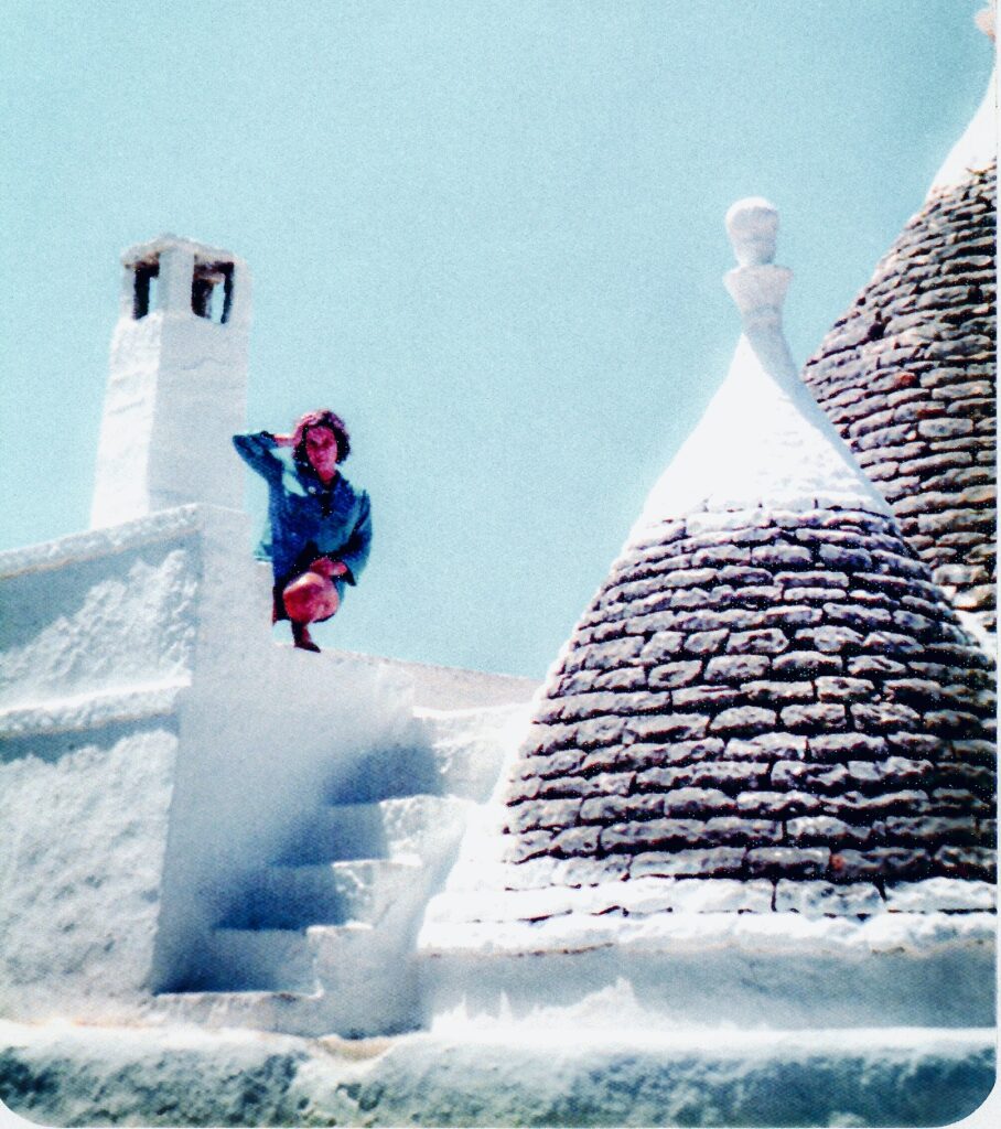As a student in Italy atop an Ostuni traditional trulli house.